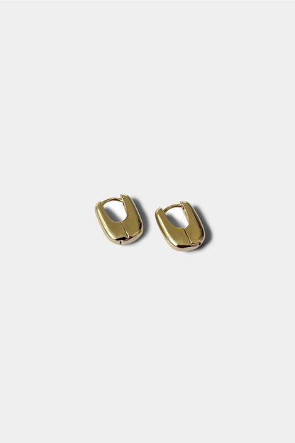 An everyday statement earring that hugs the ear perfectly. Looks great on it's own or layered with other earrings.
 Handcast in sterling silver or gold vermeil by Kara Yoo.