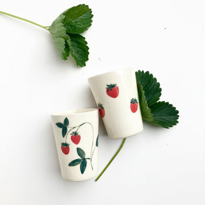 Slip casted ceramic cups in dover white (off white) and hand painted with strawberries. Handmade by Alicja in her Vermont studio.