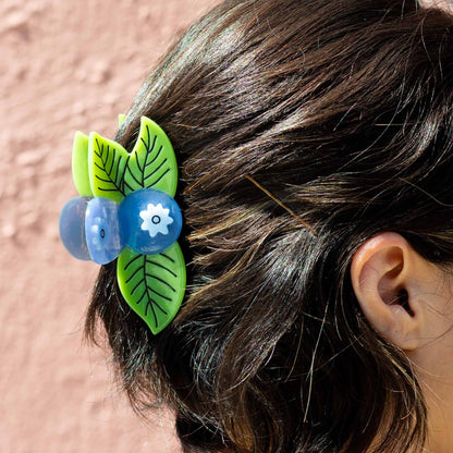 Each hair clip is made from cellulose acetate pieces that are individually cut and hand-painted, which can result in slight variations. That's what makes it unique!