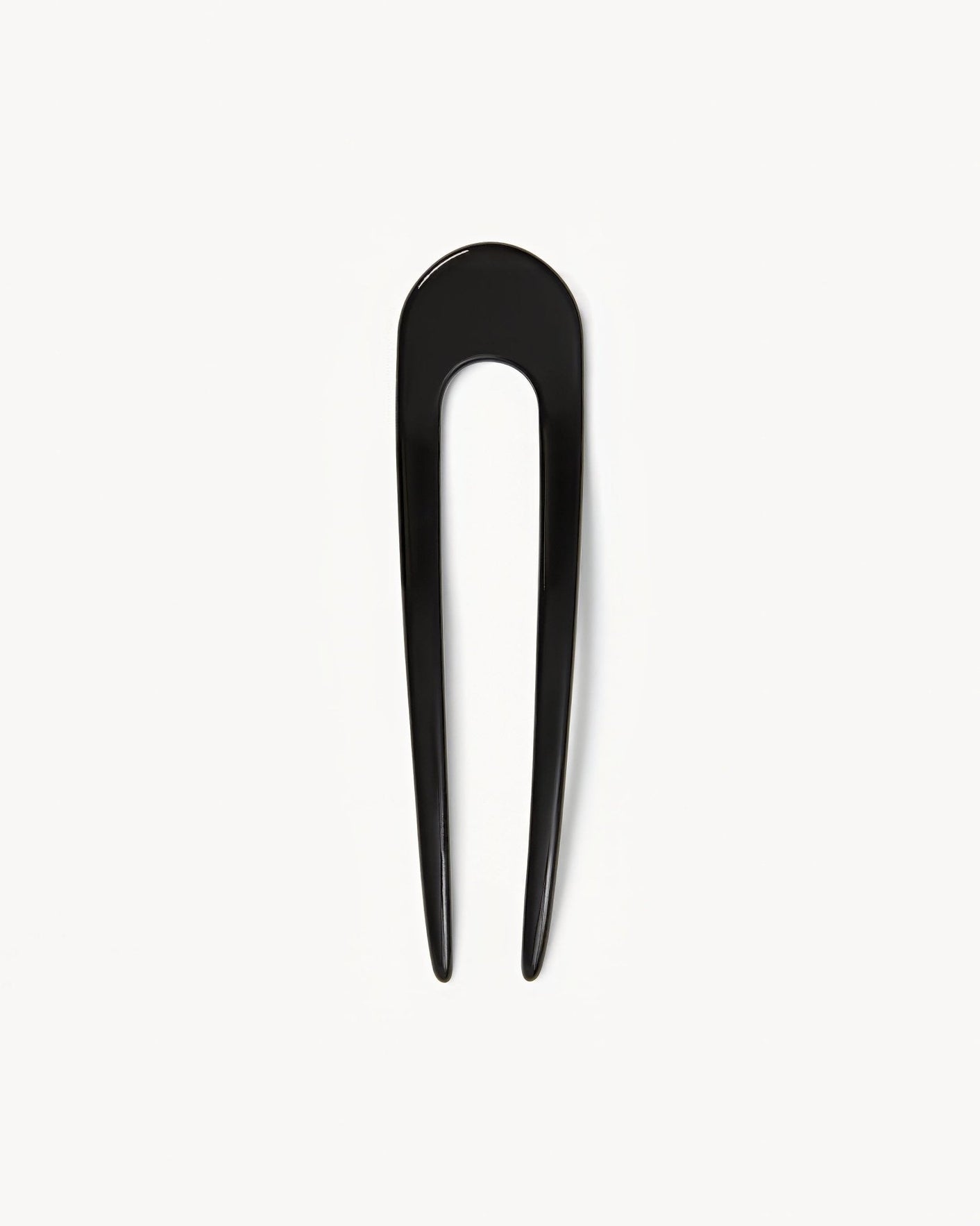 machete A classic French hair pin, hand-sculpted in fine Italian acetate. 
