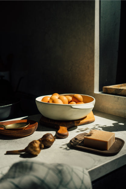 The stoneware Pebble Berry Bowl feature a creamy white glaze and characterful handles, a classic design that will feel at home in most kitchens. Practical for rinsing and straining berries, but with such a pretty design you'll want to use it to serve them as well.