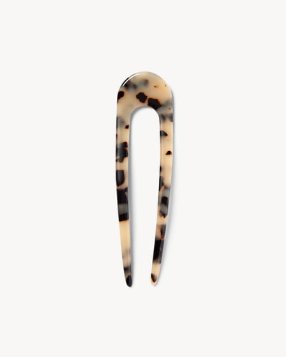 machete A classic French hair pin, hand-sculpted in fine Italian acetate. 
