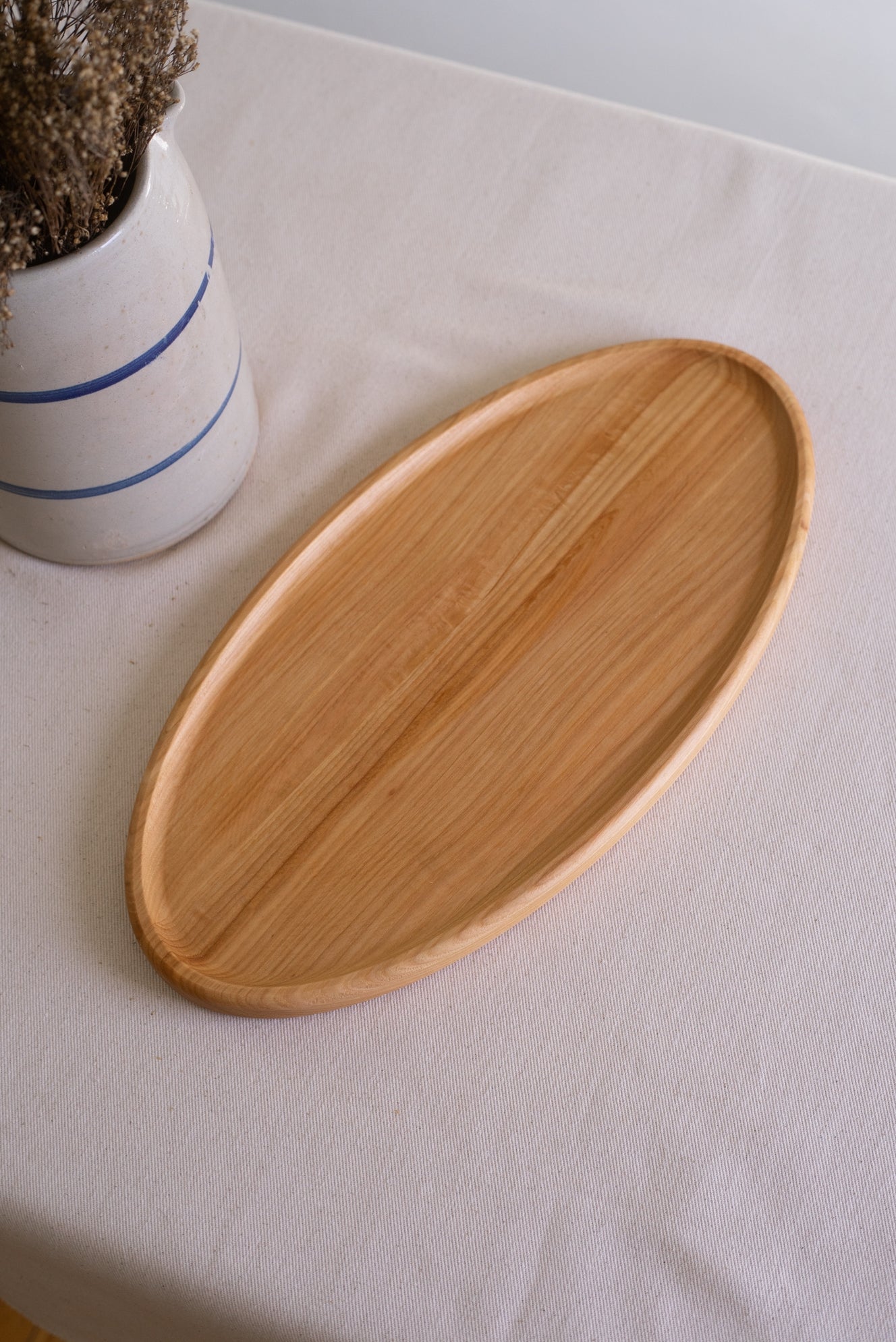 A classic in serving ware, the Hilda platter is a staple for hosting dinner parties and holidays. Handcrafted from mid-tone hickory wood. All Timbermade items are designed and handcrafted by Jon & Bre in their ND shop