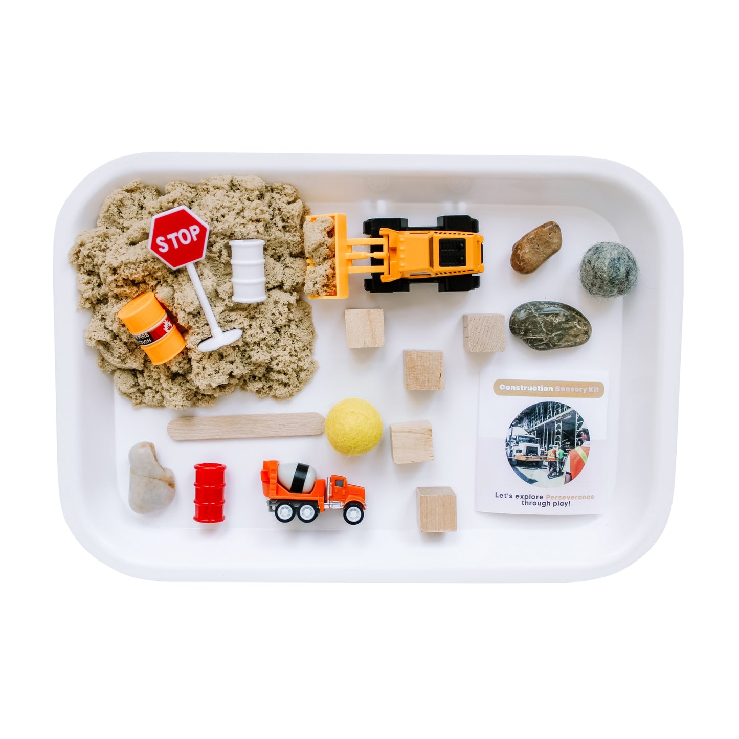 Dig, build, load, and explore with this Construction themed Kit. Little hands will love the opportunities for open-ended play as we explore the emotional skill of Perseverance through play. Includes 6 oz of hypoallergenic moldable sensory sand, mini wooden stick for scooping, and small parts for play.