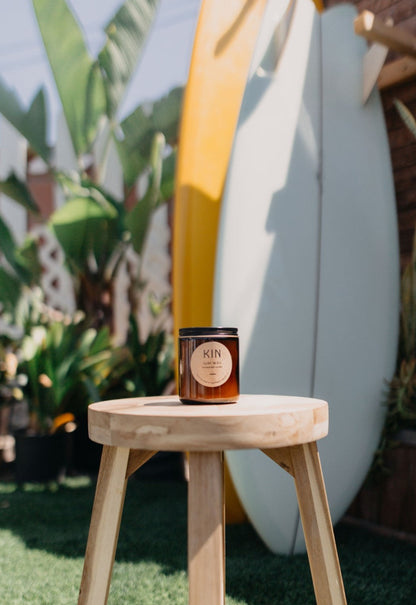 Surf Wax Candle by Kin Candle Co. Tropical and cleansing. Sweet coconut and freshly squeezed lime inspired by the iconic smell of surf wax.