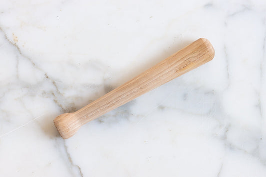 Craft the perfect cocktail with this wooden muddler. Easily muddle herbs and fruit at the bottom of a glass to release juices that will infuse your beverage.
Handmade in Hungary.