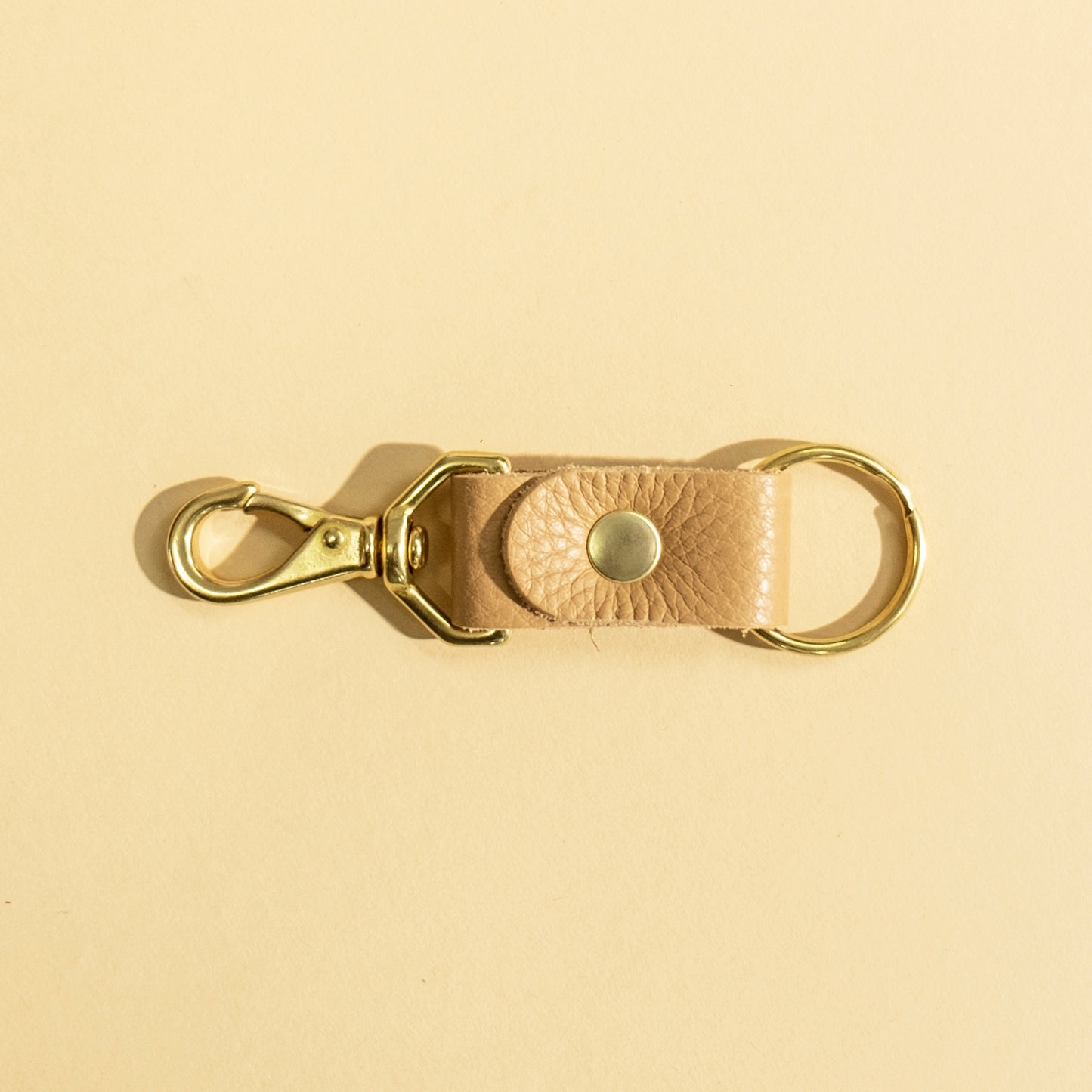 Organize your keys while making a modern statement with Primecut's keychain. This product uses scrap material that would normally be thrown away. Made in Portland, Oregon.