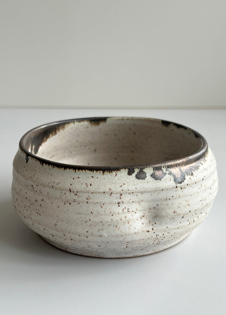 A new little bowl to add to your kitchen! Use these for spices, dips and sauces. Each bowl is wheel thrown. This item is full of texture and character. Crafted in Lakewood, OH by Gina DeSantis.