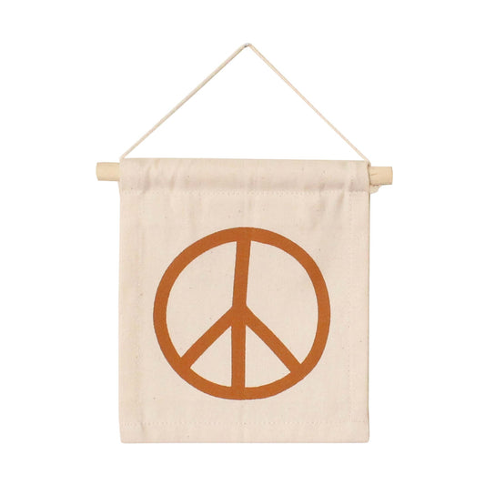 Rust peace sign on natural canvas hang sign with wooden dowel.&nbsp;Sewn and screen printed by hand on natural canvas by Kenyan artisans.
