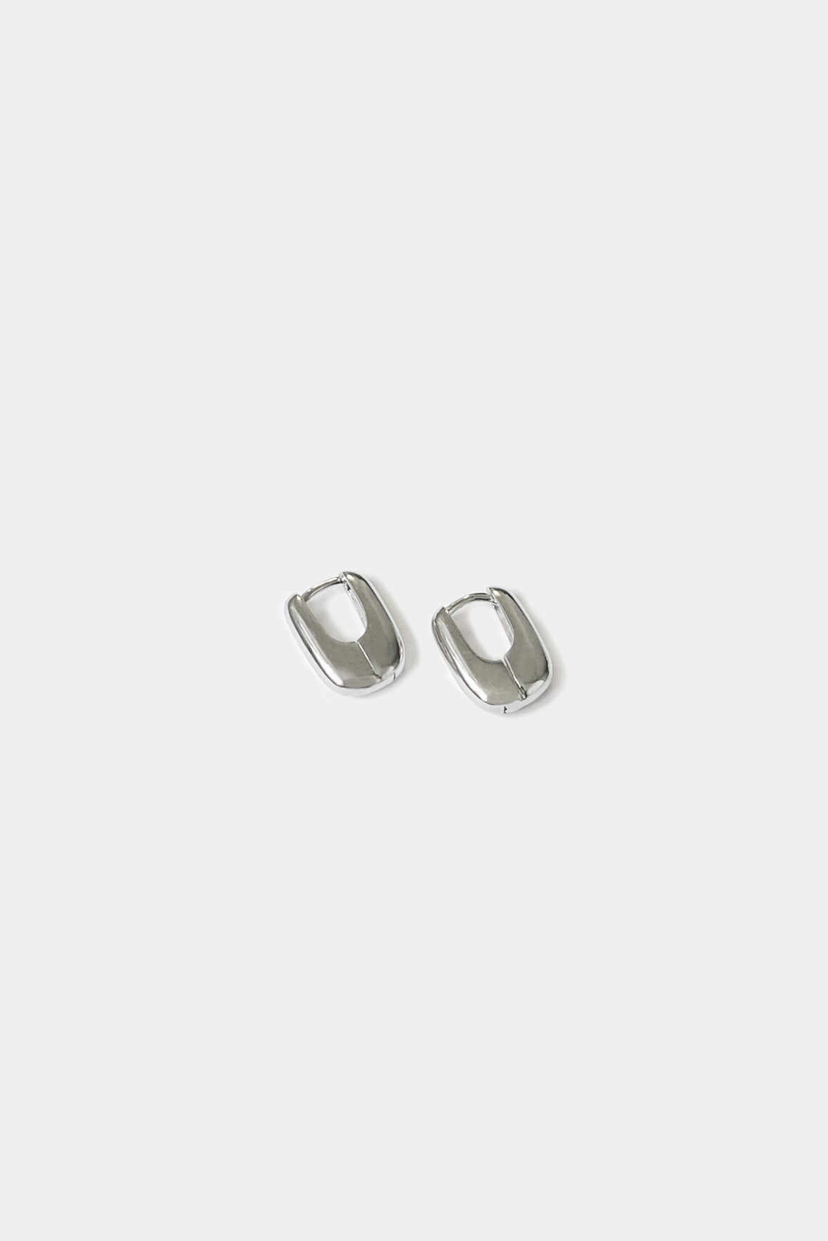 An everyday statement earring that hugs the ear perfectly. Looks great on it's own or layered with other earrings.
 Handcast in sterling silver or gold vermeil by Kara Yoo.