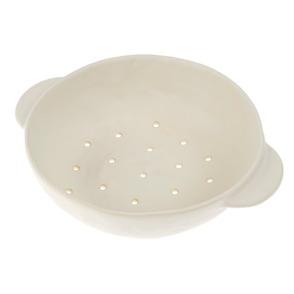 The stoneware Pebble Berry Bowl feature a creamy white glaze and characterful handles, a classic design that will feel at home in most kitchens. Practical for rinsing and straining berries, but with such a pretty design you'll want to use it to serve them as well.