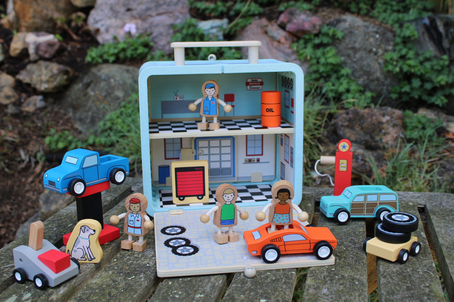 Suitcase Series encourages portable play. Each suitcase opens up on both sides to reveal a world of fun.

The 16-piece Auto Repair Shop has everything you need for hours of fun, including cars, lift, retro gas pump, customers, mechanics, and more!