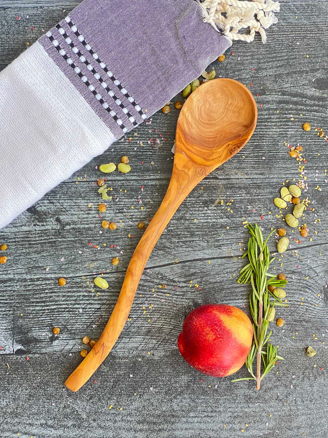 Beautifully handcrafted, this fun and practical spoon made with the finest olive wood will be perfect to serve in style.
 Ethically made in Tunisia.