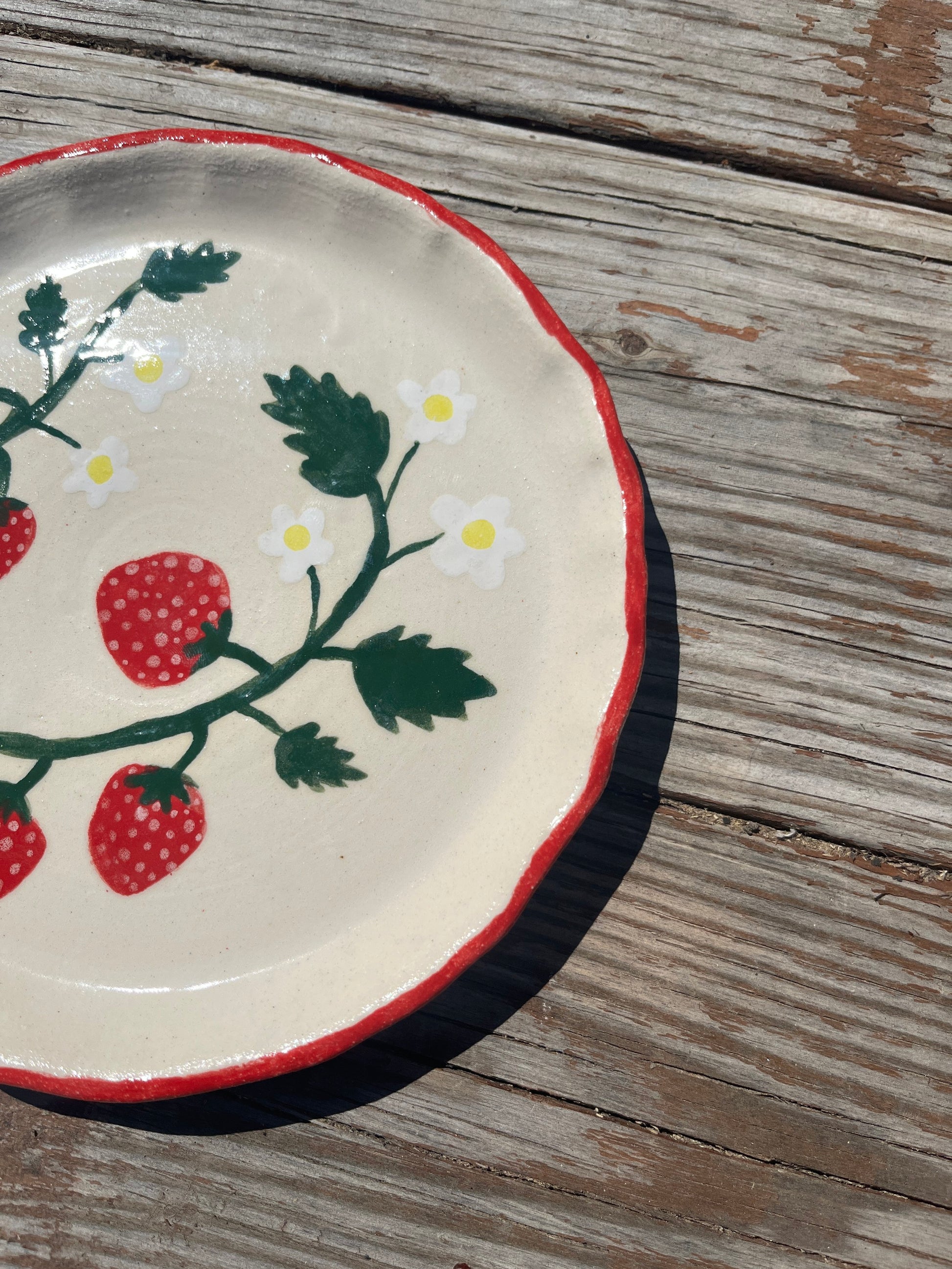 Strawberries salad/lunch plate by ninth house goods. A hand-painted lunch plate designed for your spring and summer gatherings. The perfect lunch or salad plate for your fresh harvests. Your new go-to to impress guests at your home. Wheel-thrown white clay with clear glaze.