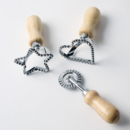 These kid-safe eco-dough tools have no harmful sharp edges but cut through dough with ease. Make star and heart shaped “cookies” or use the cutting wheel to create free-form shapes. Inspire your child’s imagination while improving fine motor skills. No plastic parts, cleans with warm sudsy water.