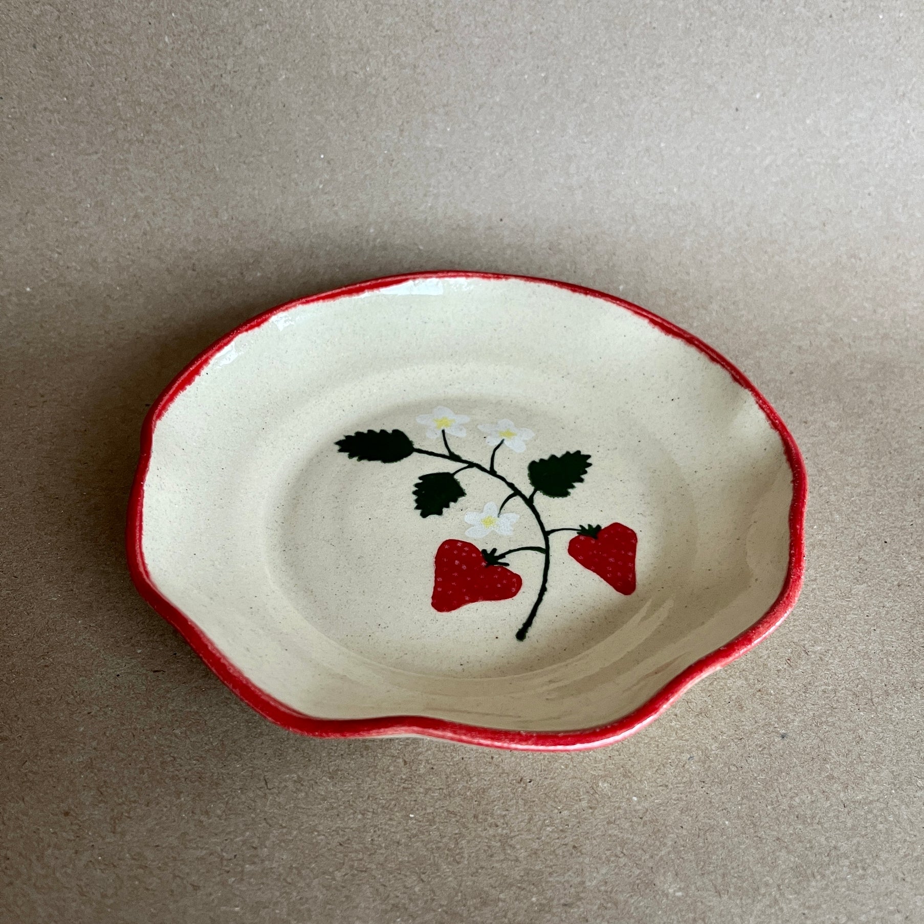 A hand-painted side plate designed for your spring and summer gatherings. The perfect for your side dishes and appetizers. Wheel-thrown white clay with clear glaze.