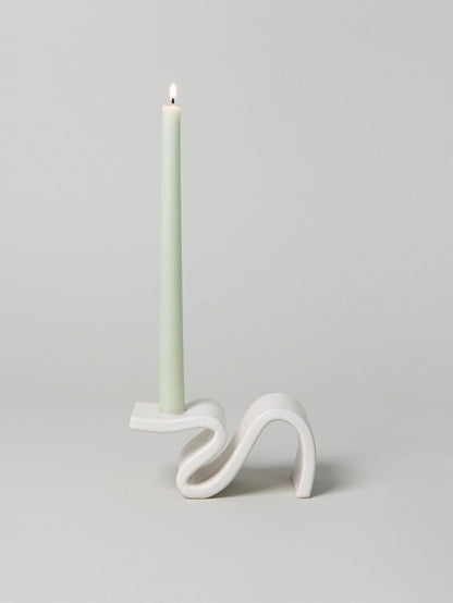 Introducing Wei, a candlestick designed to evoke the romance of a foregone era. This unique piece combines elements of classic design with a modern twist. Its cantilevered surface pays homage to contemporary architecture, seamlessly blending tradition with innovation. Handmade in Brooklyn, NY.