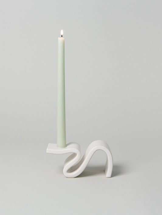 Introducing Wei, a candlestick designed to evoke the romance of a foregone era. This unique piece combines elements of classic design with a modern twist. Its cantilevered surface pays homage to contemporary architecture, seamlessly blending tradition with innovation. Handmade in Brooklyn, NY.