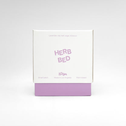 Herb Bed brings home the magical woody and herbaceous scent of homegrown, newly harvested herbs. Airy lavender, hazy tobacco, and dry and herbal sage come together to form a relaxing and contemplative scent. Every candle is crafted in small batches with coconut soy wax and 100% cotton wicks.