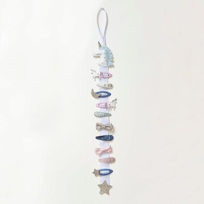 rockahula clip hanger unicorn / The perfect solution to storing and organizing hair clips in one place - included is a hanging loop that can be hung on a door or wall hook.  Simply snap on your clips ready to wear again next time!