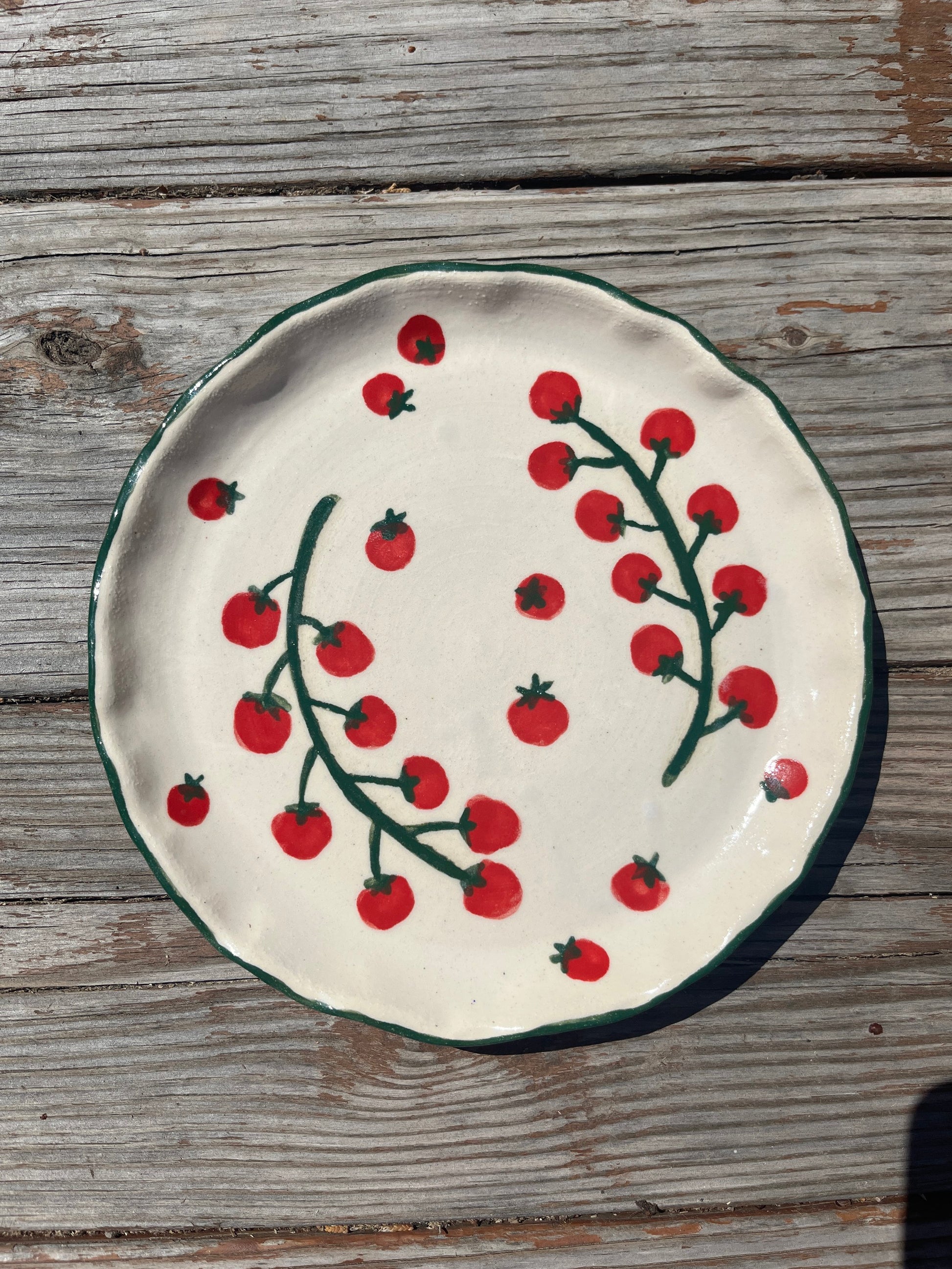 Cherry tomato salad/lunch plate by ninth house goods. A hand-painted lunch plate designed for your spring and summer gatherings. The perfect lunch or salad plate for your fresh harvests. Your new go-to to impress guests at your home. Wheel-thrown white clay with clear glaze.