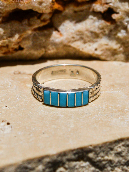 Silver and turquoise inlay ring handmade by Navajo women in Arizona