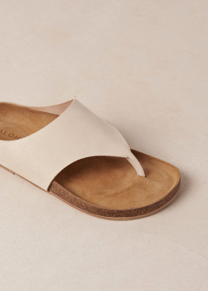 The Ivy is a thong sandal crafted from cream nubuck leather with wide straps and molded insoles. From day duties to casual evening events, this minimalist style is one for all-day wear. And thanks to its soft footbeds, you know the comfort is guaranteed. Sustainably made in Spain.