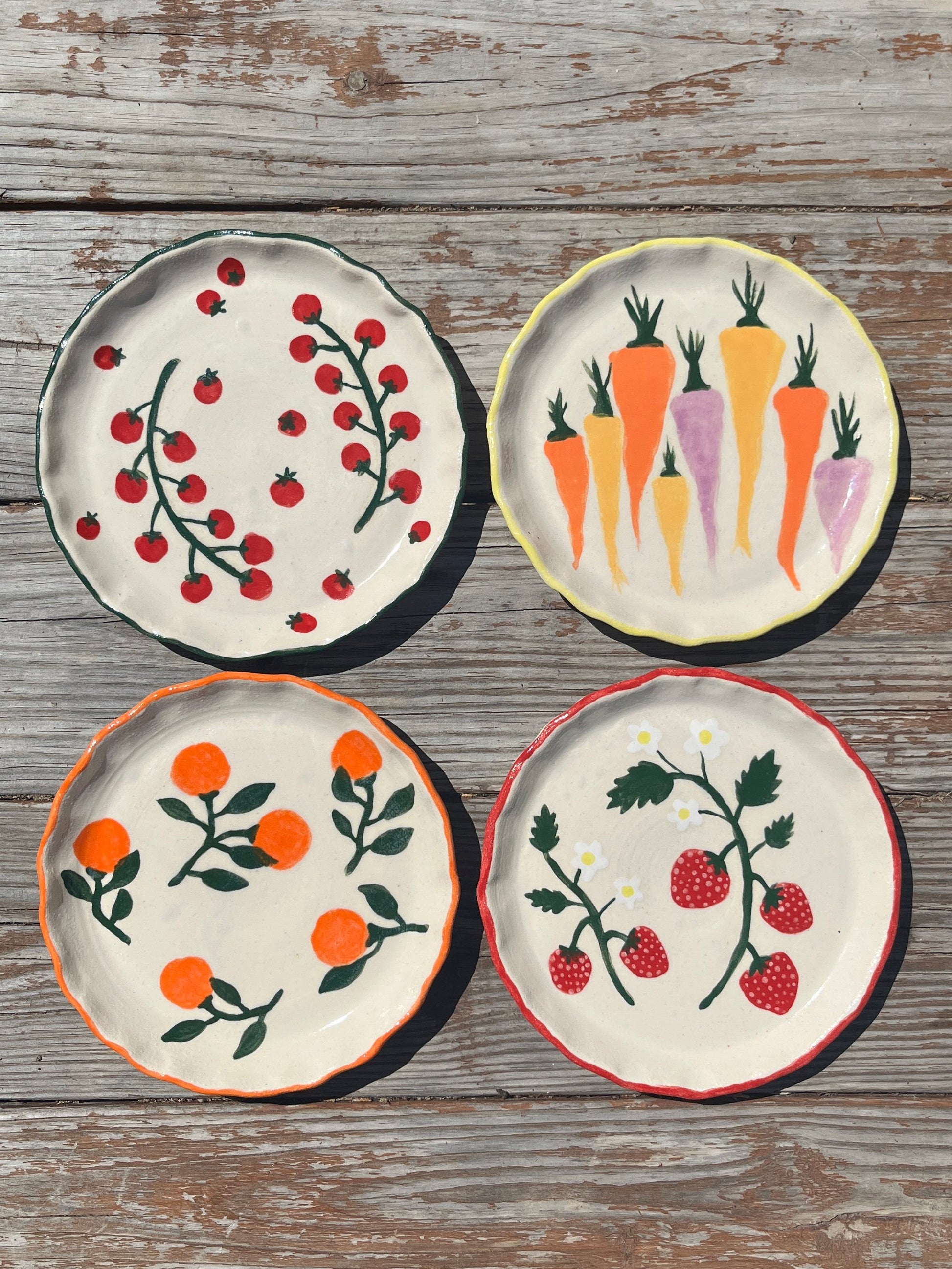 Strawberries salad/lunch plate by ninth house goods. A hand-painted lunch plate designed for your spring and summer gatherings. The perfect lunch or salad plate for your fresh harvests. Your new go-to to impress guests at your home. Wheel-thrown white clay with clear glaze.