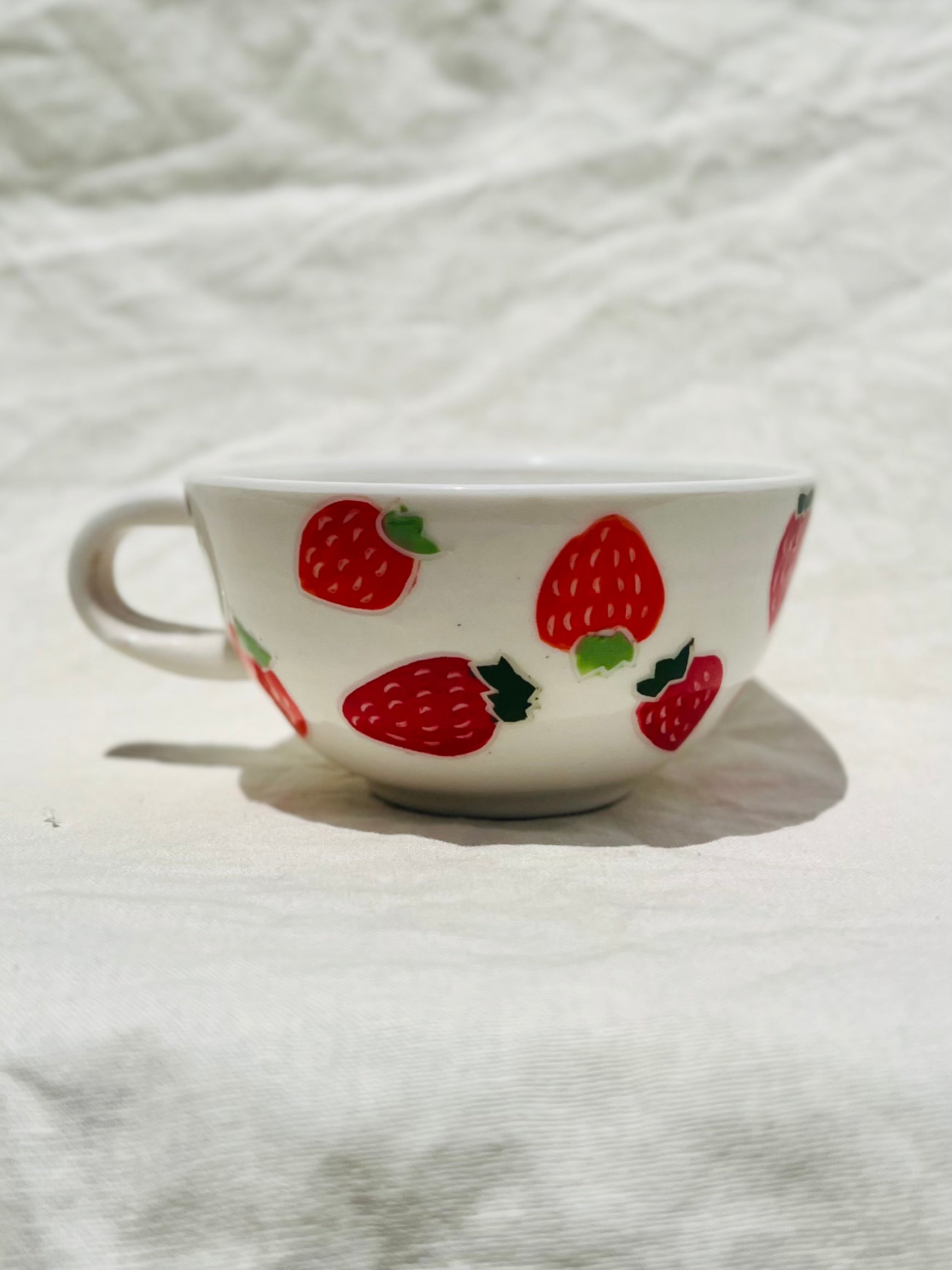 Handmade porcelain mug with hand painted limes. Made right here in Encinitas, California by Chandler Puritty. With its satisfying and ergonomic design, I think it's impossible not to feel good holding this mug and sipping your favorite tea or coffee.