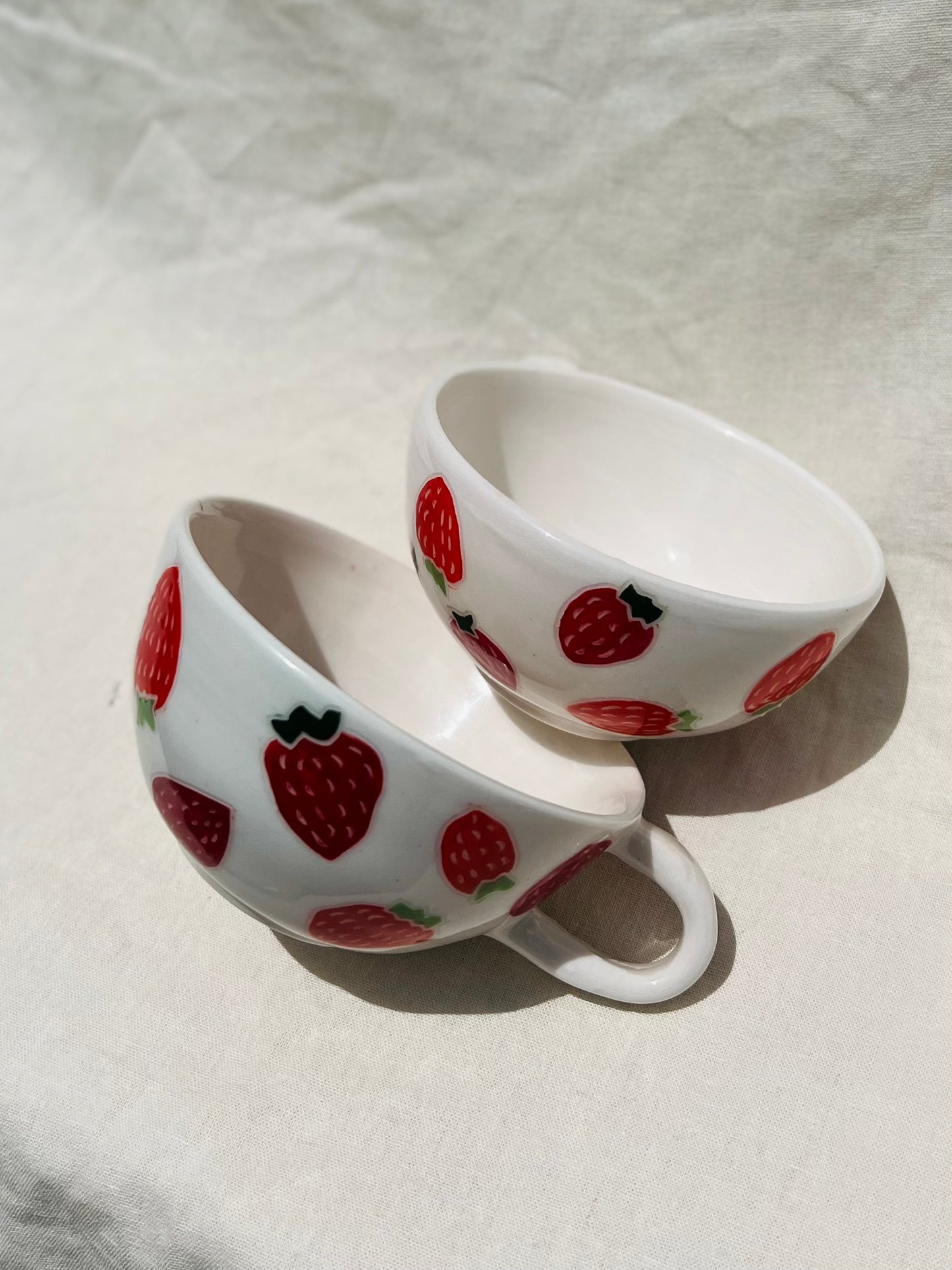 Handmade porcelain mug with hand painted limes. Made right here in Encinitas, California by Chandler Puritty. With its satisfying and ergonomic design, I think it's impossible not to feel good holding this mug and sipping your favorite tea or coffee.