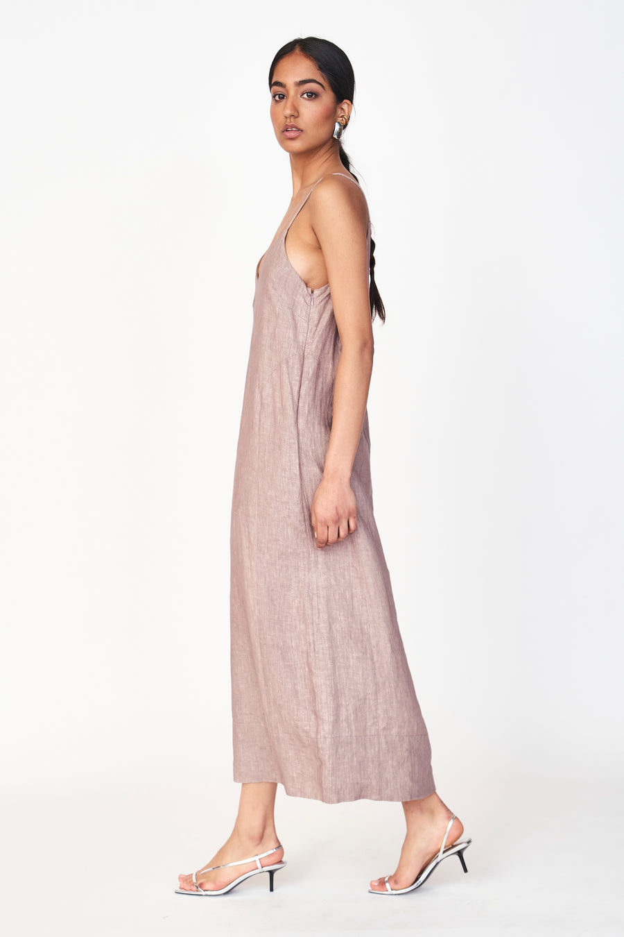 An easy, 100% linen slip dress with a straight fit and deep V neckline for an effortlessly beautiful look. Oh, and it has pockets! Ethically made in India.