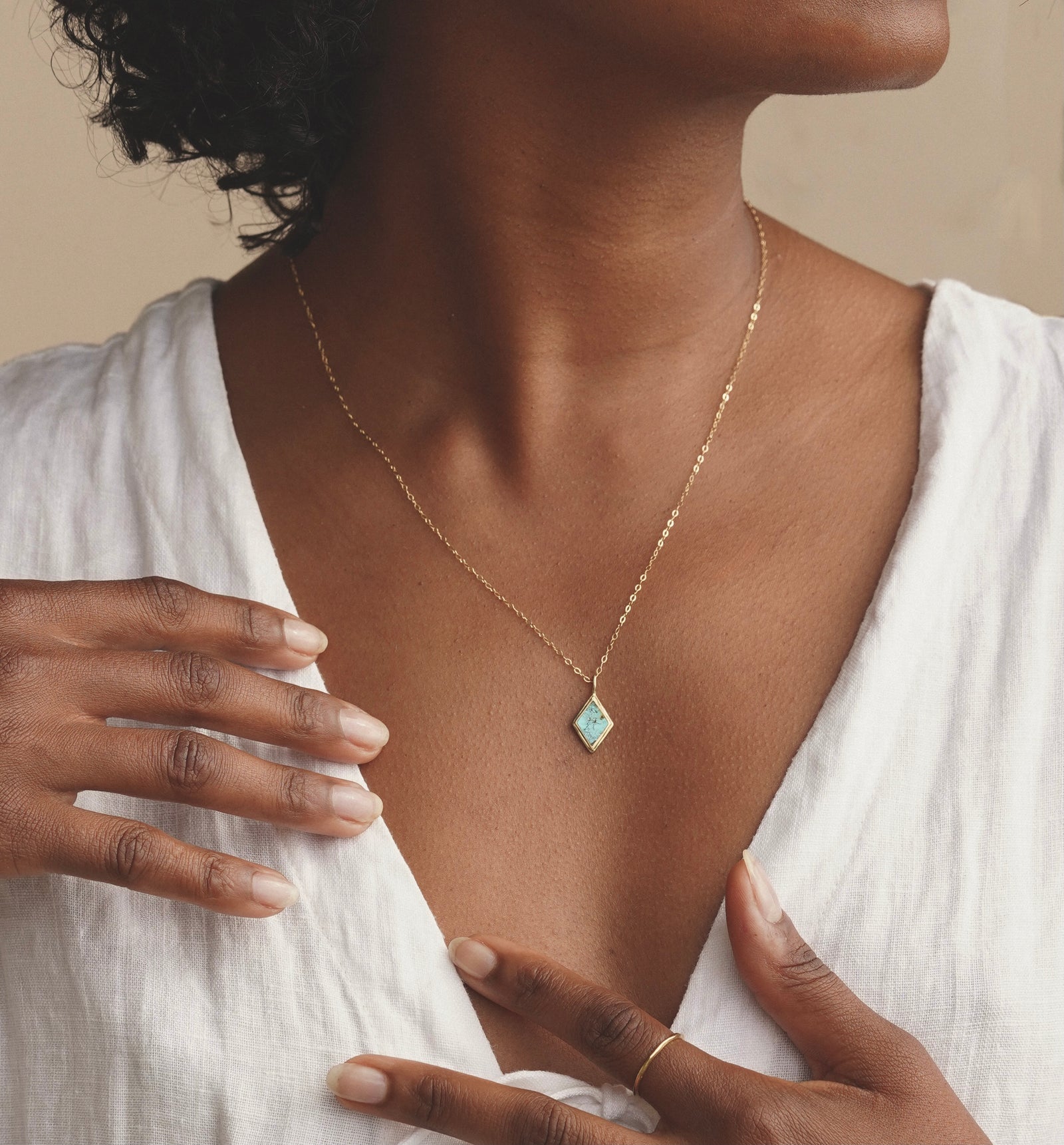 This genuine stone pendant necklace is a diamond-shaped, hand cut stone which is set in a slightly asymmetrical abstract and imperfect metal frame for an organic rustic style. Brass & gold filled. Handmade in the Santa Cruz Mountains.