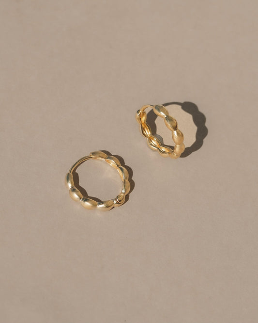 14k gold vermeil petal earrings / Simple floral inspired hollow hinged hoops, light weight every day comfort and organic ease.  Handmade in the Santa Cruz mountains.