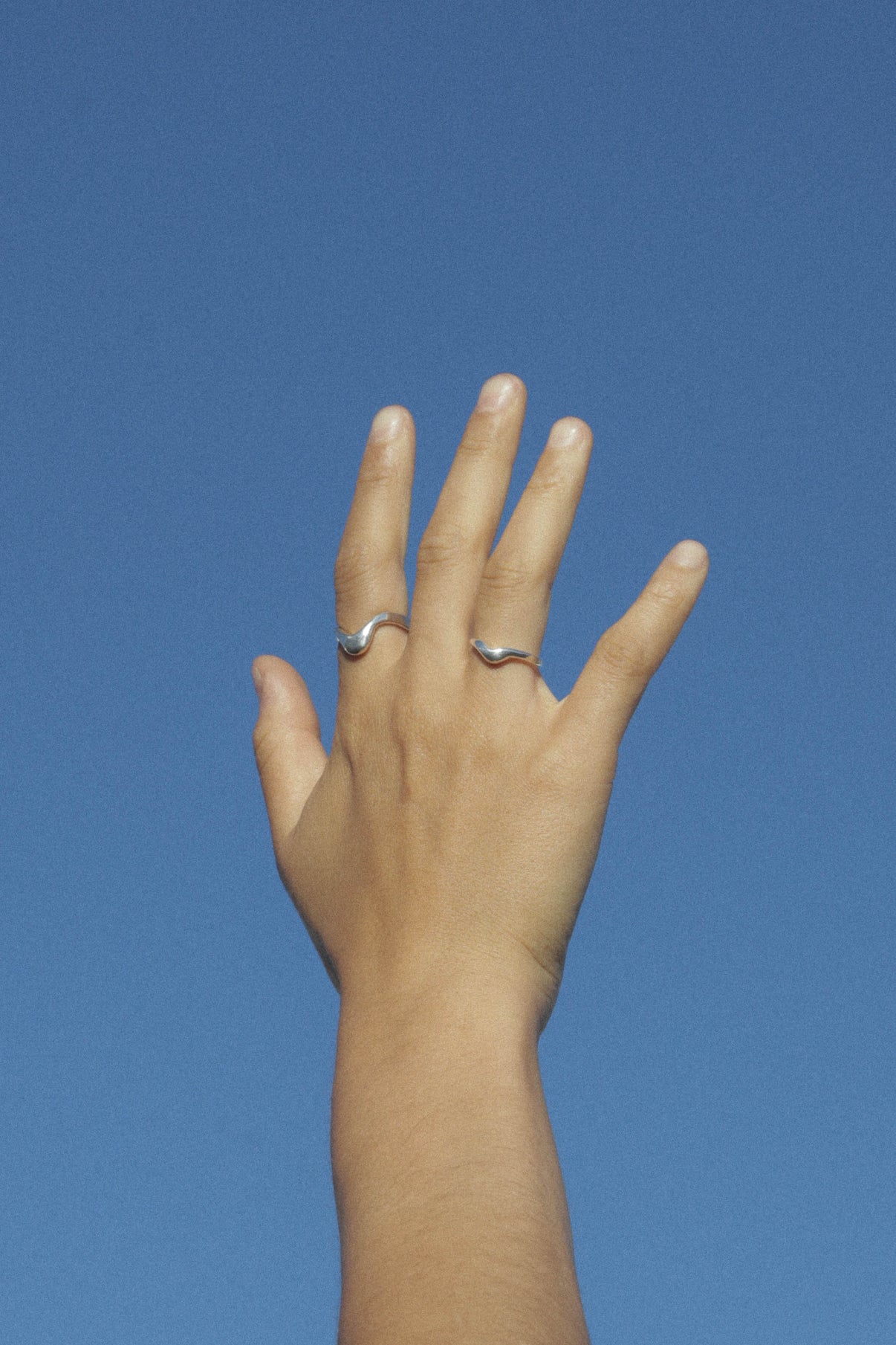 The High Tide ring is inspired by the movement of rising water.  Hand carved and cast with a high polished mirror finish. Available in solid brass or sterling silver.