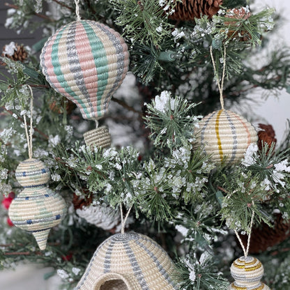 Exceptional handwoven ornaments designed to elevate any occasion. Handmade in Rwanda from all natural fibers of Sisal. 