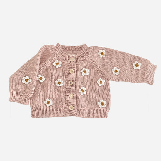 Stroll through fields of flowers with the Flower Cardigan in Blush. Featuring Cream hand-crochet flowers. Crafted with care using 100% Hand-knit Acrylic