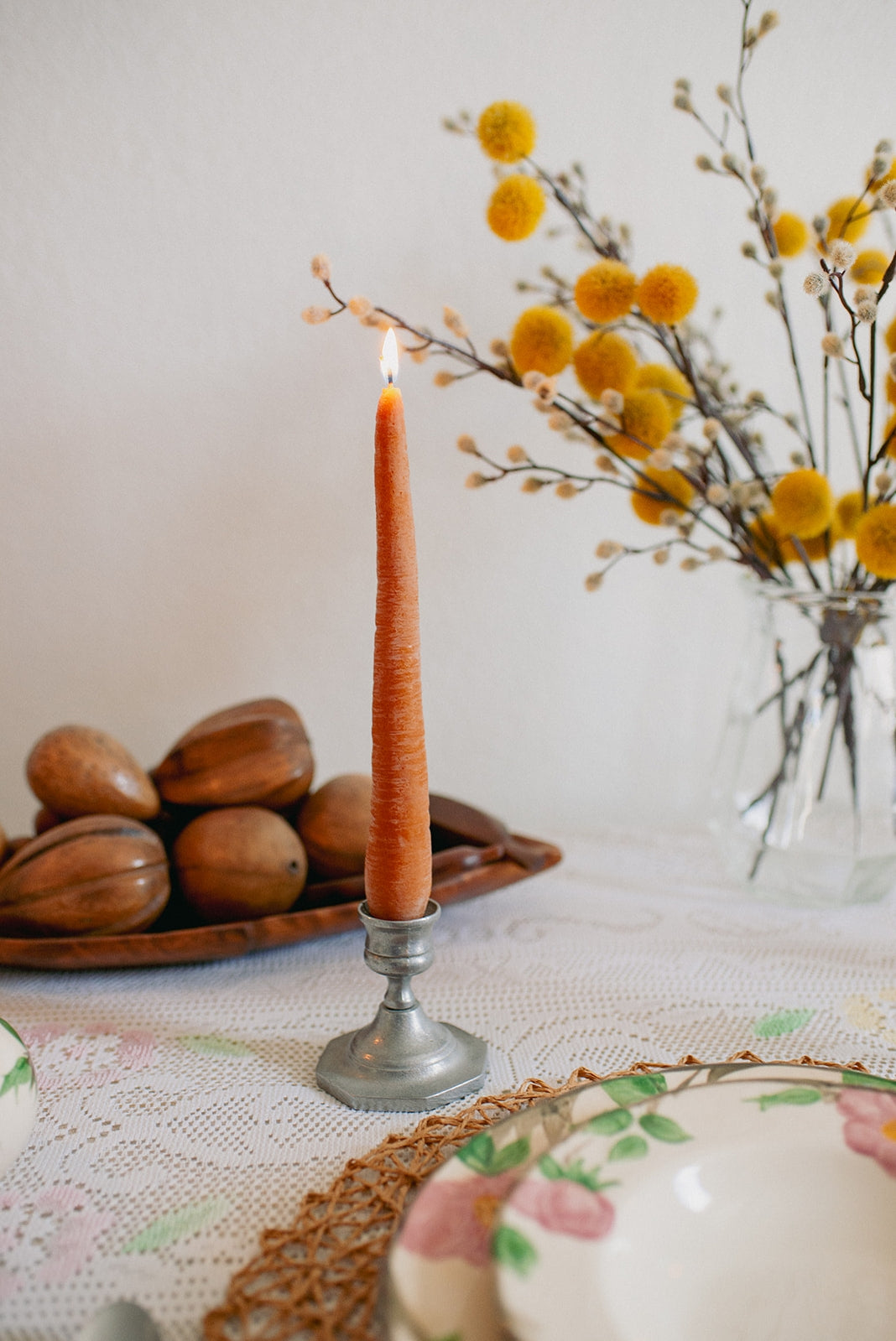 happy organics Beeswax tapers that have been meticulously shaped to resemble fresh carrots, these candles are a delightful fusion of artistry and nature. Made from pure beeswax, they emanate a natural, sweet aroma