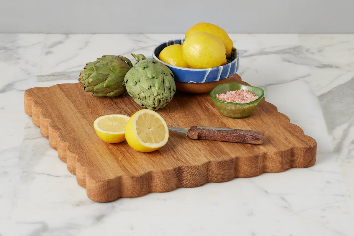 The perfect blend of modern style and whimsical charm for your kitchen. The unique scalloped edges add movement and subtle femininity while the natural wood grain adds texture to your countertop.