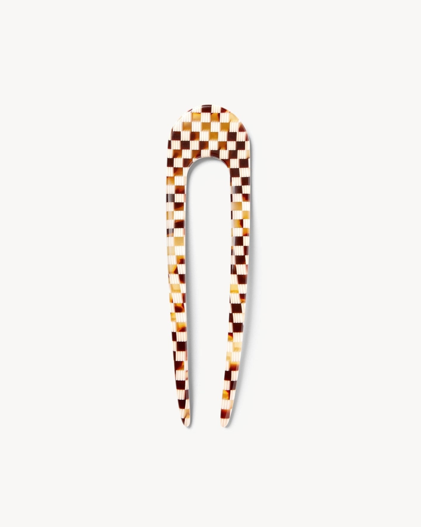 machete A classic French hair pin, hand-sculpted in fine Italian acetate. 
