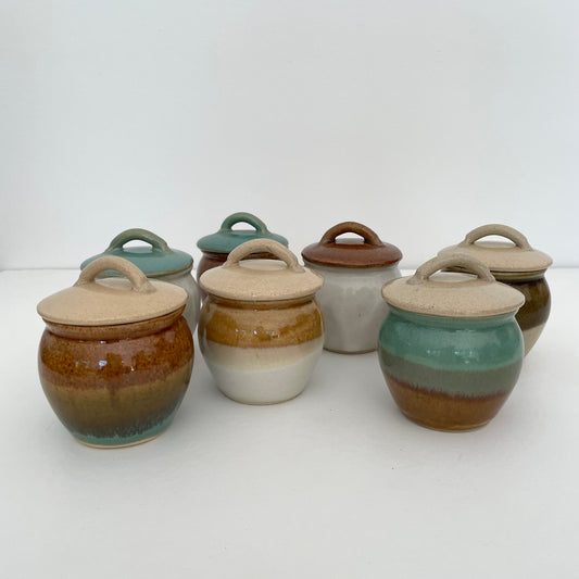 These tiny pots are perfect for keeping salt or sugar handy on the kitchen counter w/ the ceramic making them resistant to moisture!&nbsp;

Handmade by artisans in Japan.