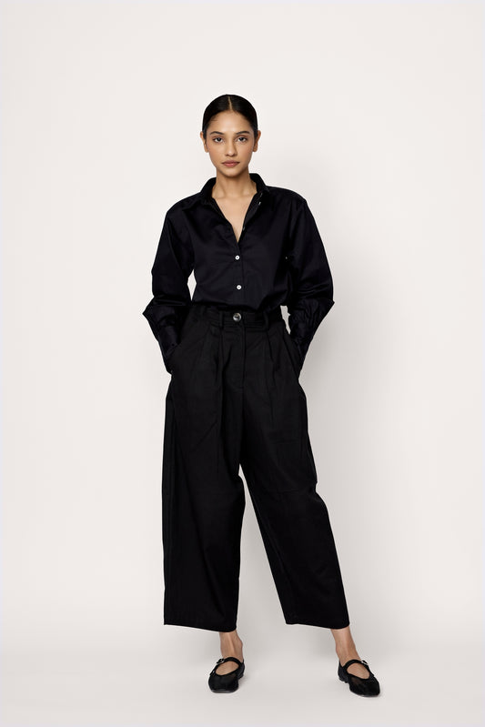 laude boyfriend pant / Introducing the versatile Workwear-Inspired pleated front Boyfriend Trouser, crafted from organic cotton twill for everyday comfort and style.

Designed with a tailored waistband, convenient side pockets, and a sleek zip, this trouser merges functionality with sophistication.
