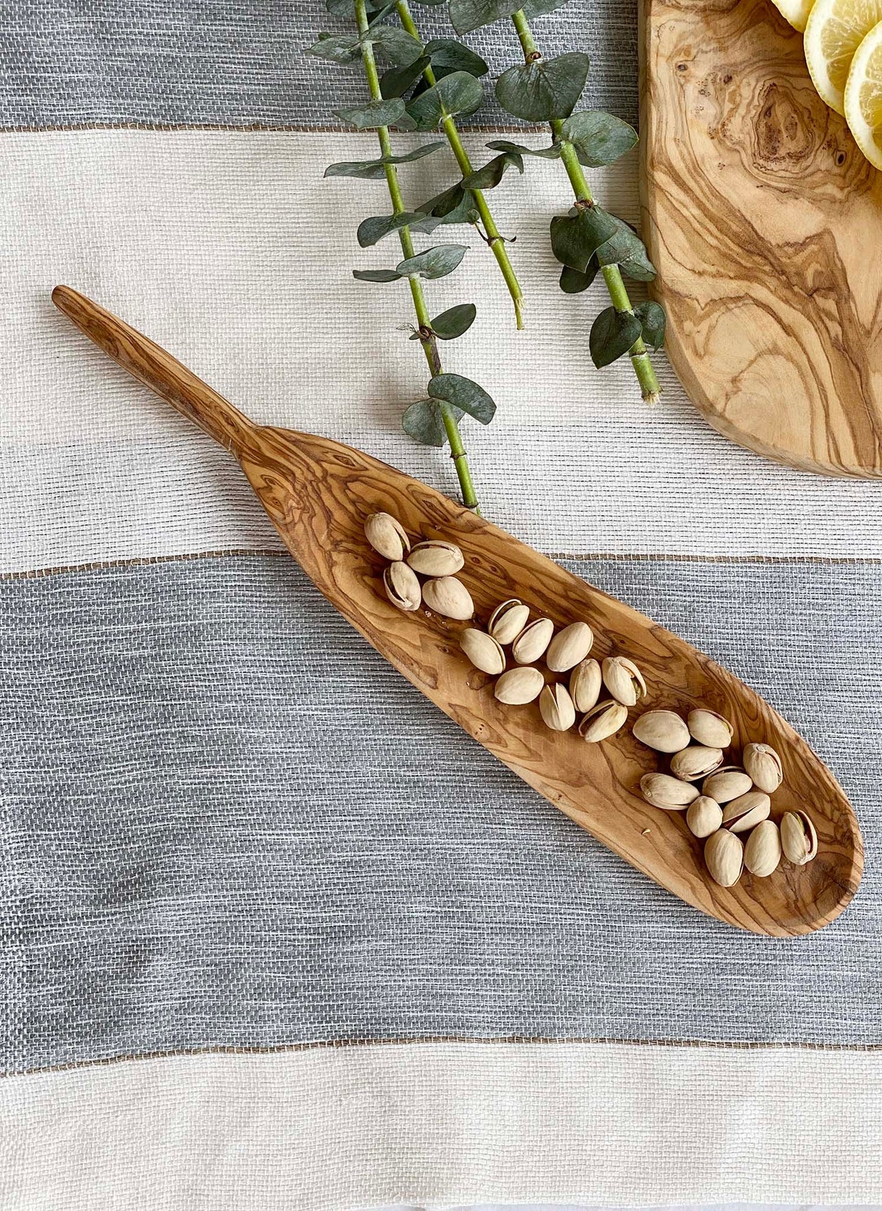 Serve your appetizers on this fun, original yet practical oval tapas dish. Perfect for olives, nuts, chocolate and so much more. Ethically made in Tunisia.