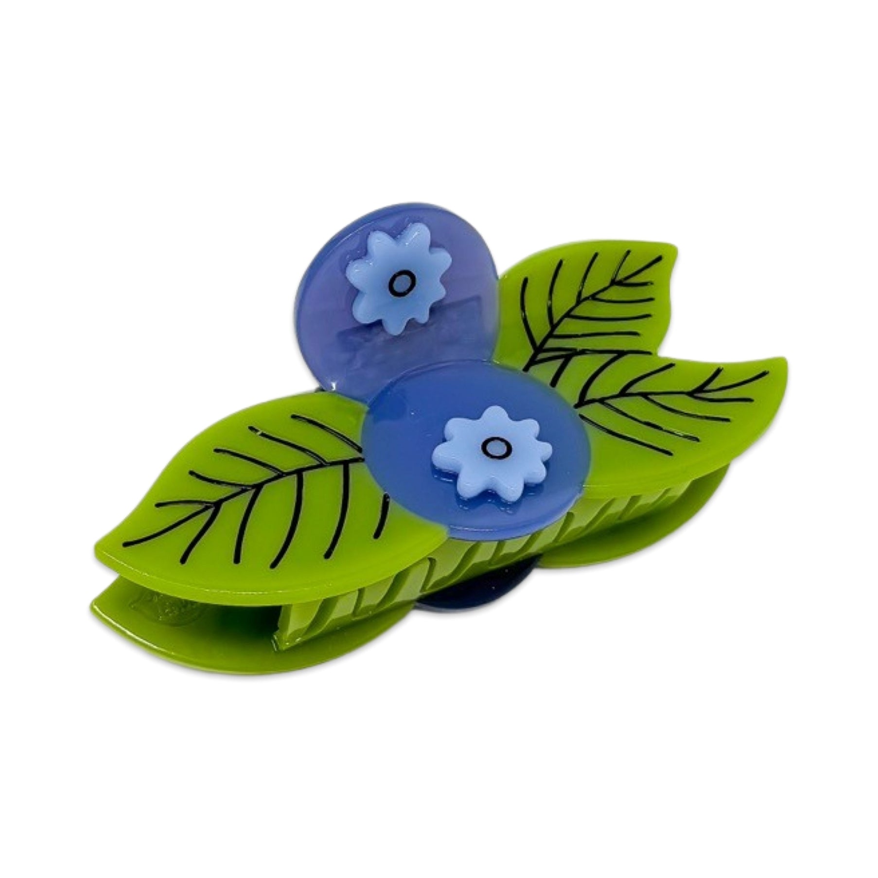 Each hair clip is made from cellulose acetate pieces that are individually cut and hand-painted, which can result in slight variations. That's what makes it unique!