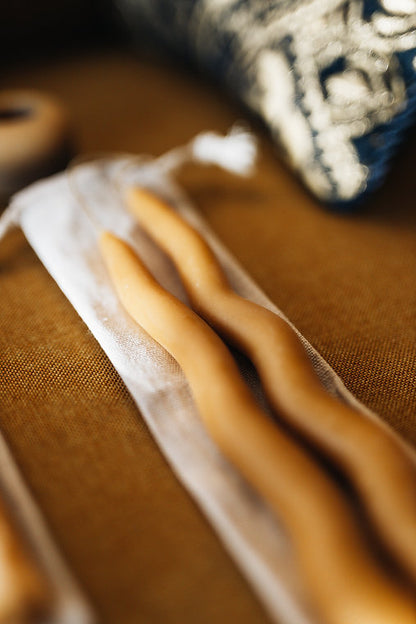 The wavy taper candles are hand-dipped and then shaped by hand and dipped again up to 30x. The unique wavy shape gives the traditional taper a modern style. Pure beeswax dipped on hemp/beeswax wick. 