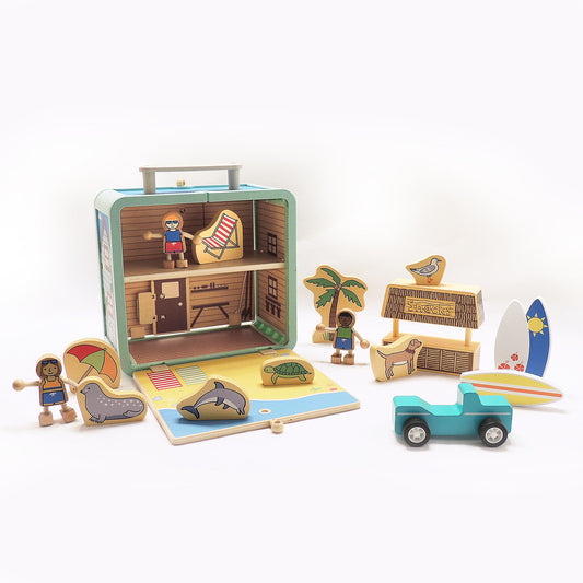 Suitcase Series encourages portable play. Each suitcase opens up on both sides to reveal a world of fun.

The 17-piece Surf Shack has everything for fun on the go, including surfer kids, surf boards, a dog, dolphin, snack shack, and more!