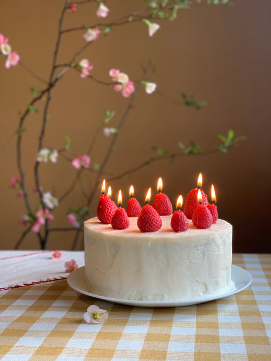 Strawberry birthday candles by Happy Organics. 100% beeswax, 5 strawberries per box.