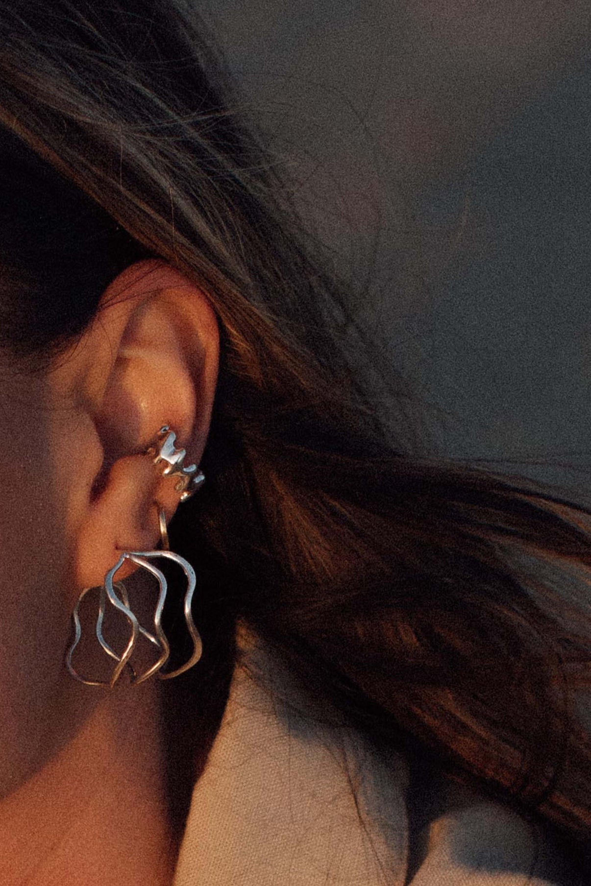 This ear cuff is inspired by the frilly wavy blade of wakame seaweed. Perfect for wearing a layered earring look without needing a piercing.  Hand carved and cast with a high polished mirror finish. Available in solid brass or sterling silver.