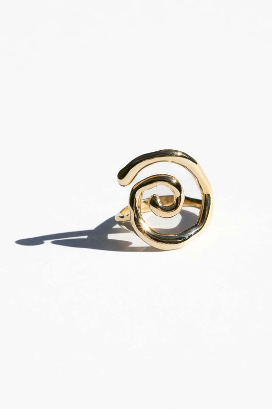 This statement ring is inspired by the fluid and mesmerizing movement of seaweed underwater.  Hand carved and cast with a high polish mirror finish. Each swirl is a bit unique in shape. Available in solid brass or sterling silver. 