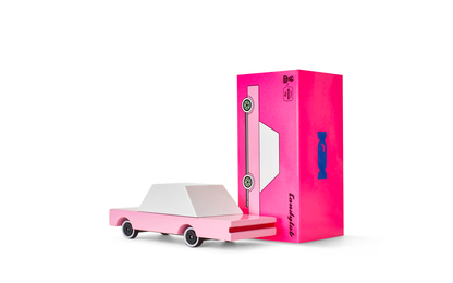 Pink Sedan toy car by Candylab Toys features solid beech wood and water-based paints. Made sustainably, made to last, made for fun. Wood, soy inks, water-based paints, degradable rubber, and metal parts are all part of Candylab's old school way of making toys, with a modern design twist.