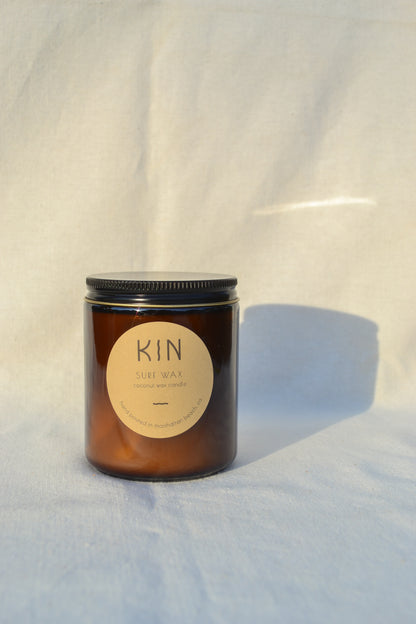 Surf Wax Candle by Kin Candle Co. Tropical and cleansing. Sweet coconut and freshly squeezed lime inspired by the iconic smell of surf wax.